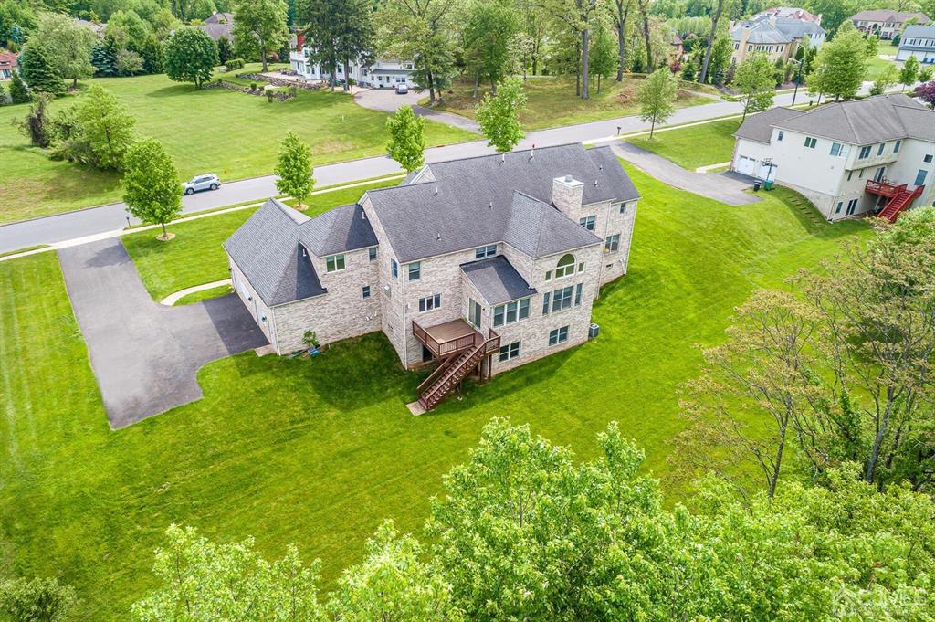 12 Hayduk Drive Edison, NJ 08820 - Photo 61 of 64 an aerial view of a house with outdoor space and a lake view
