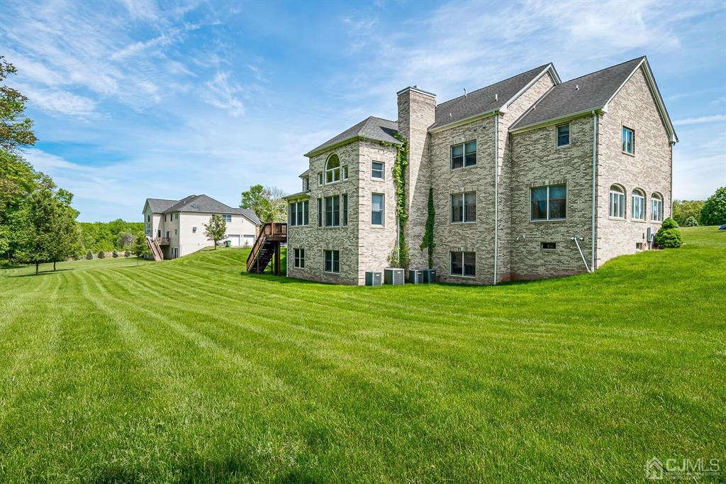 12 Hayduk Drive Edison, NJ 08820 - Photo 7 of 64 a front view of house with yard and green space
