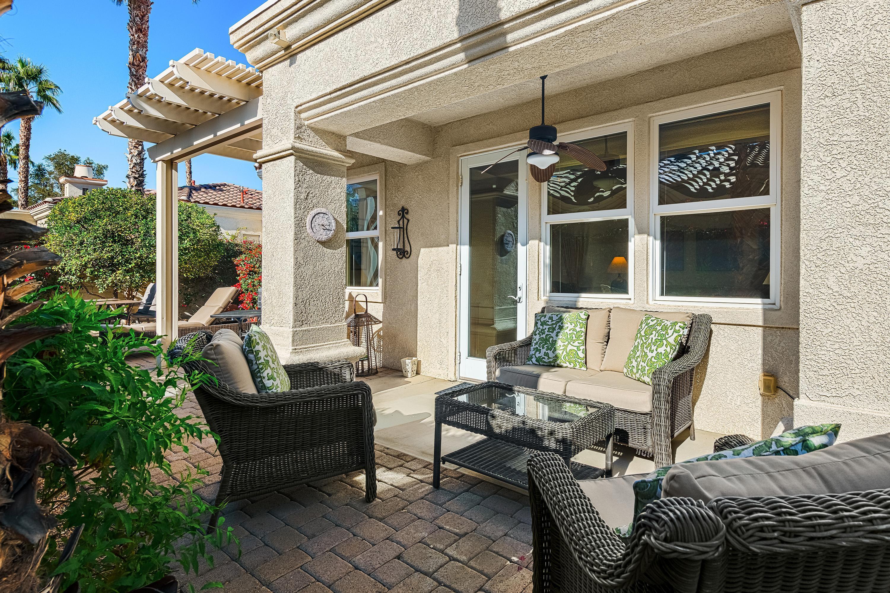 80921 Calle Azul La Quinta, CA 92253 - Photo 14 of 42 a outdoor living space with furniture and a potted plant