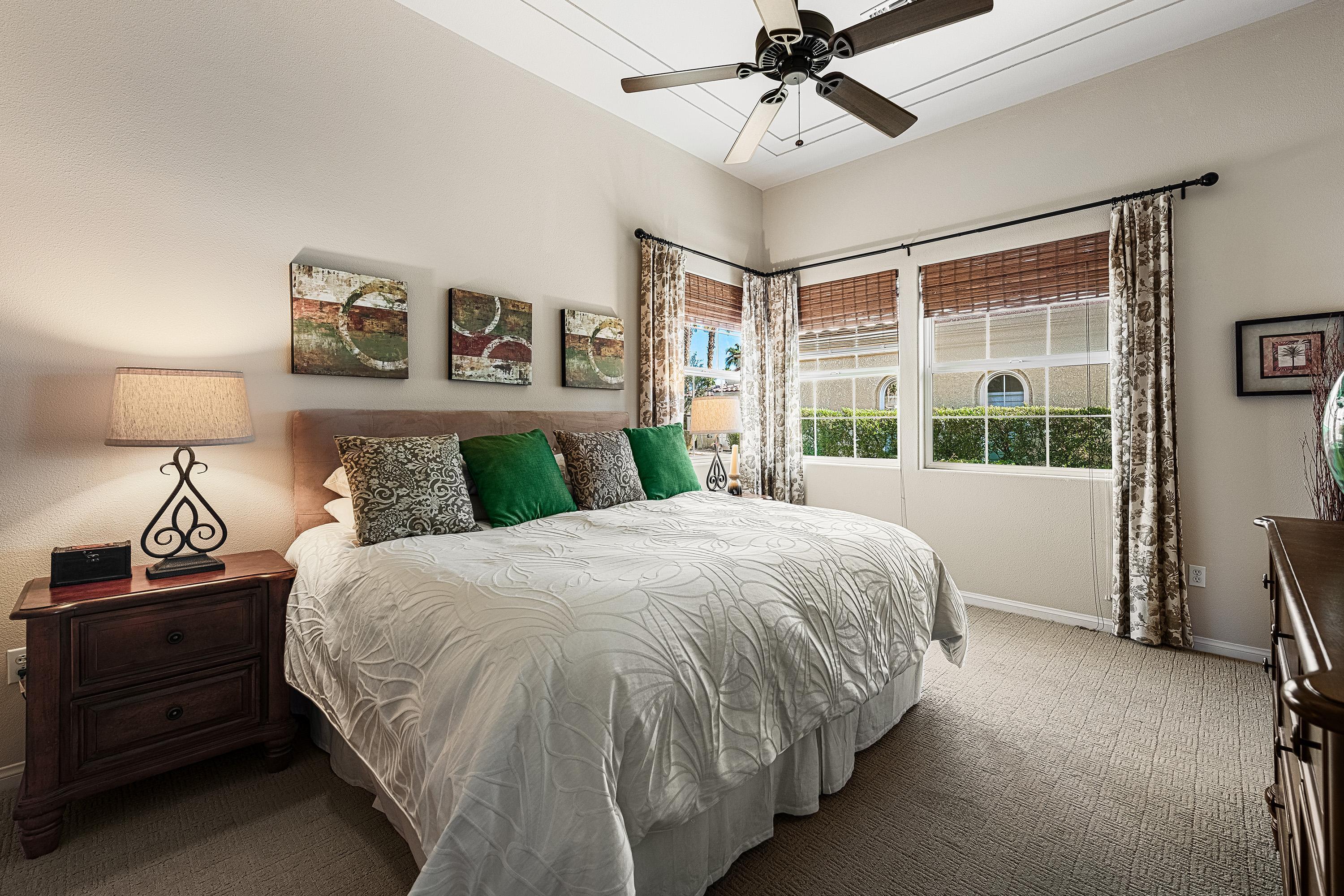 80921 Calle Azul La Quinta, CA 92253 - Photo 20 of 42 a bedroom with a bed and window