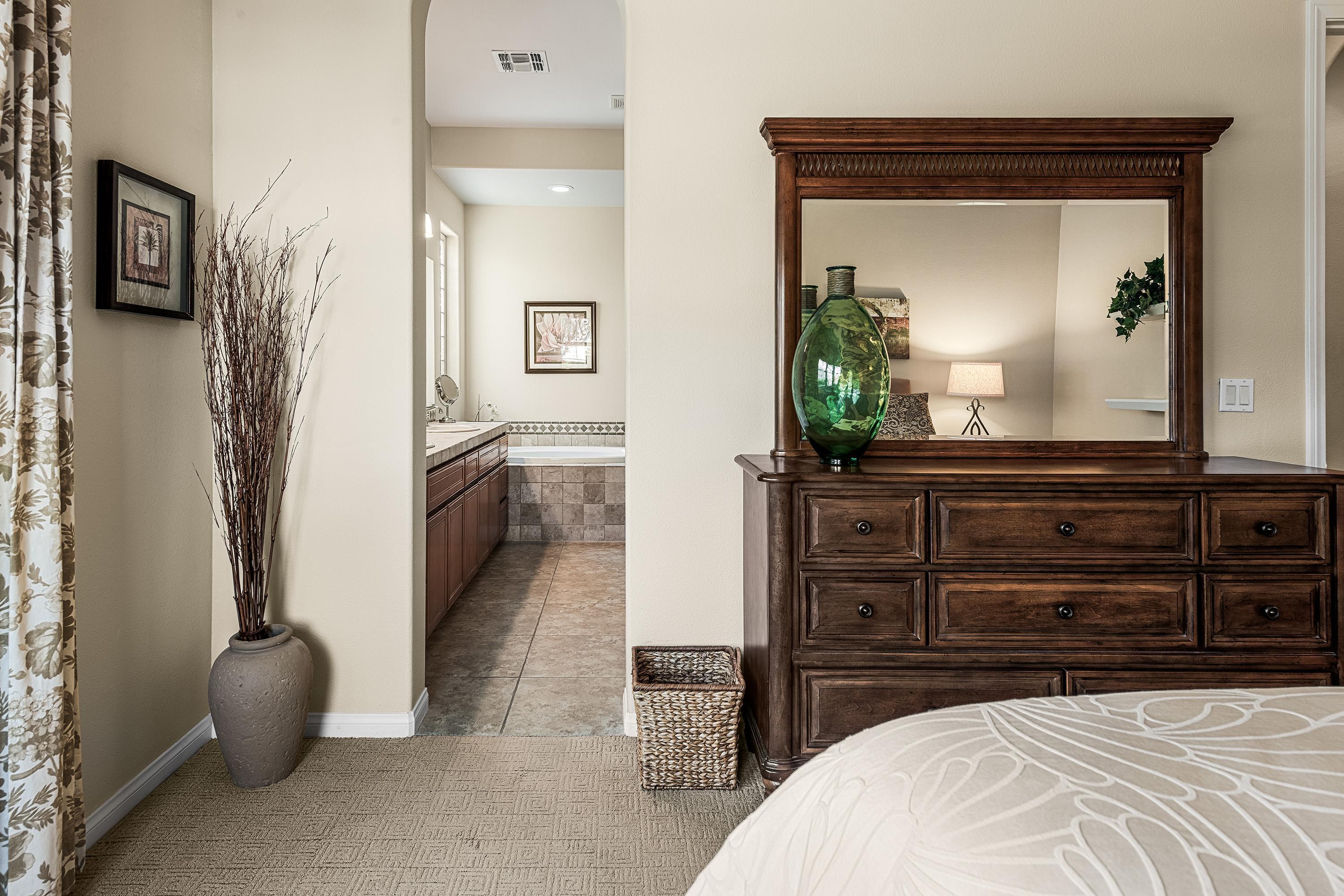 80921 Calle Azul La Quinta, CA 92253 - Photo 22 of 42 a bedroom with a bed and a dresser