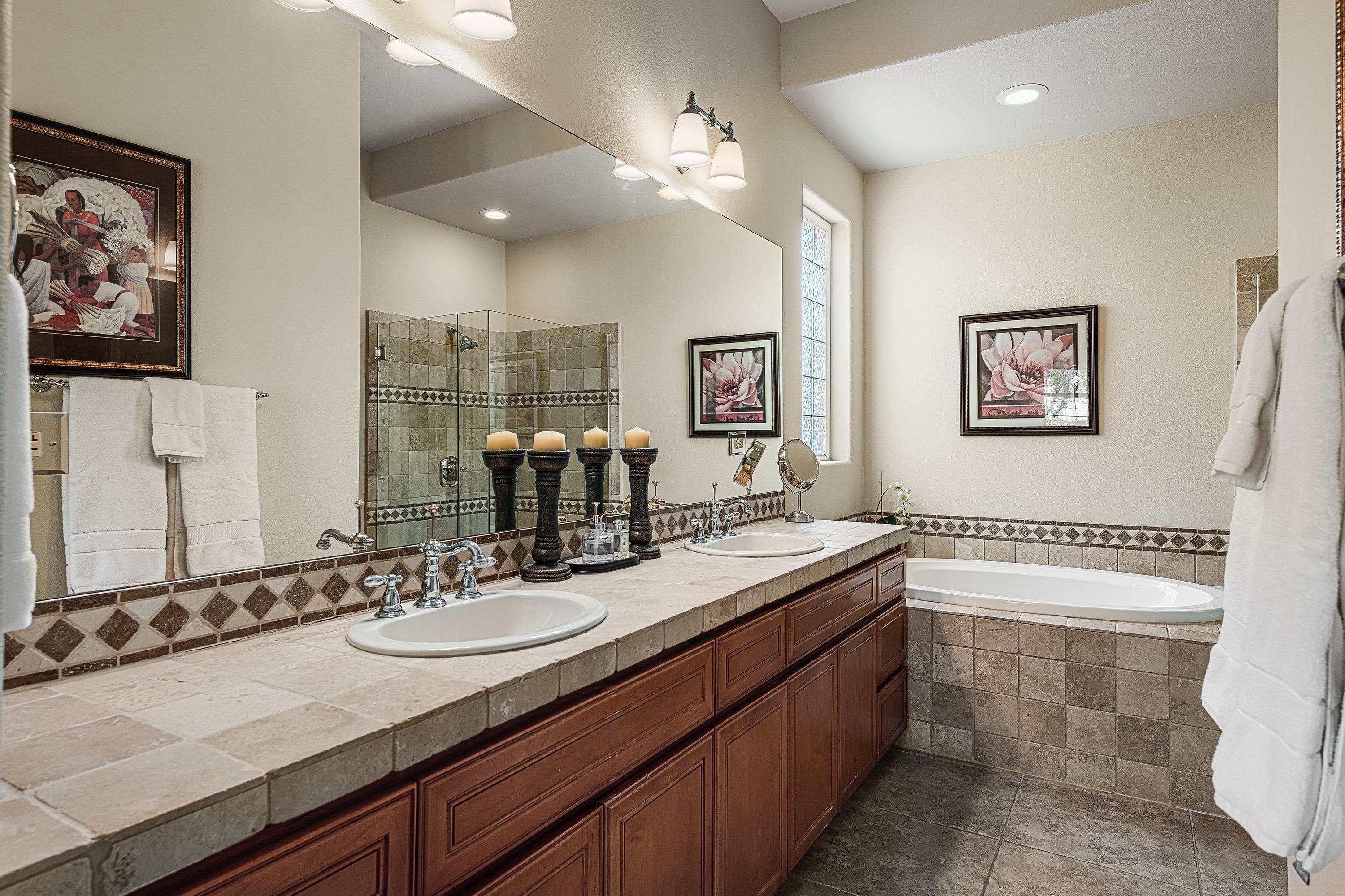 80921 Calle Azul La Quinta, CA 92253 - Photo 23 of 42 a bathroom with a sink double vanity and a mirror