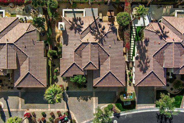 a view of front door with yellow lighting