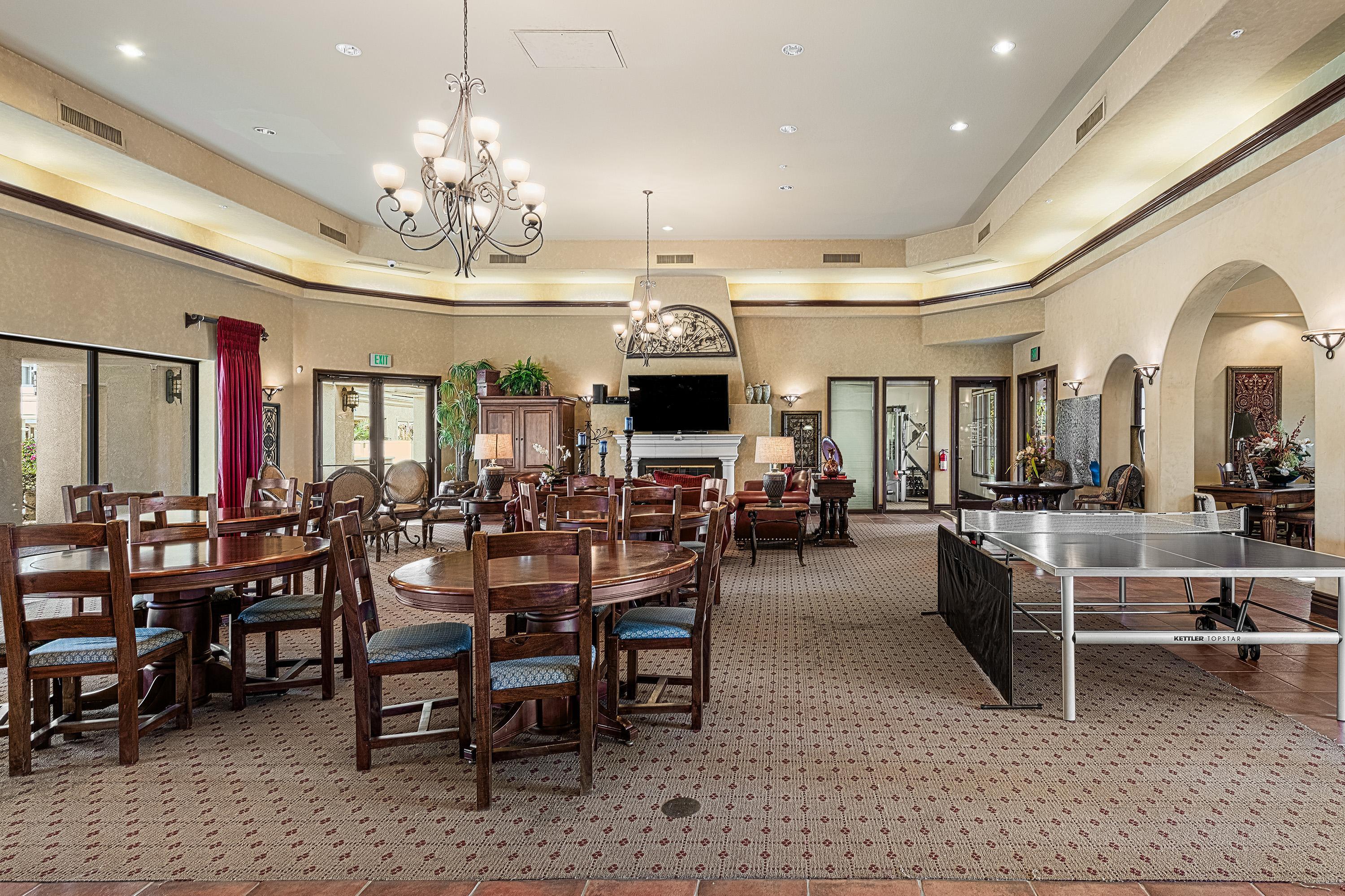 80921 Calle Azul La Quinta, CA 92253 - Photo 32 of 42 a view of a dining room with furniture and chandelier