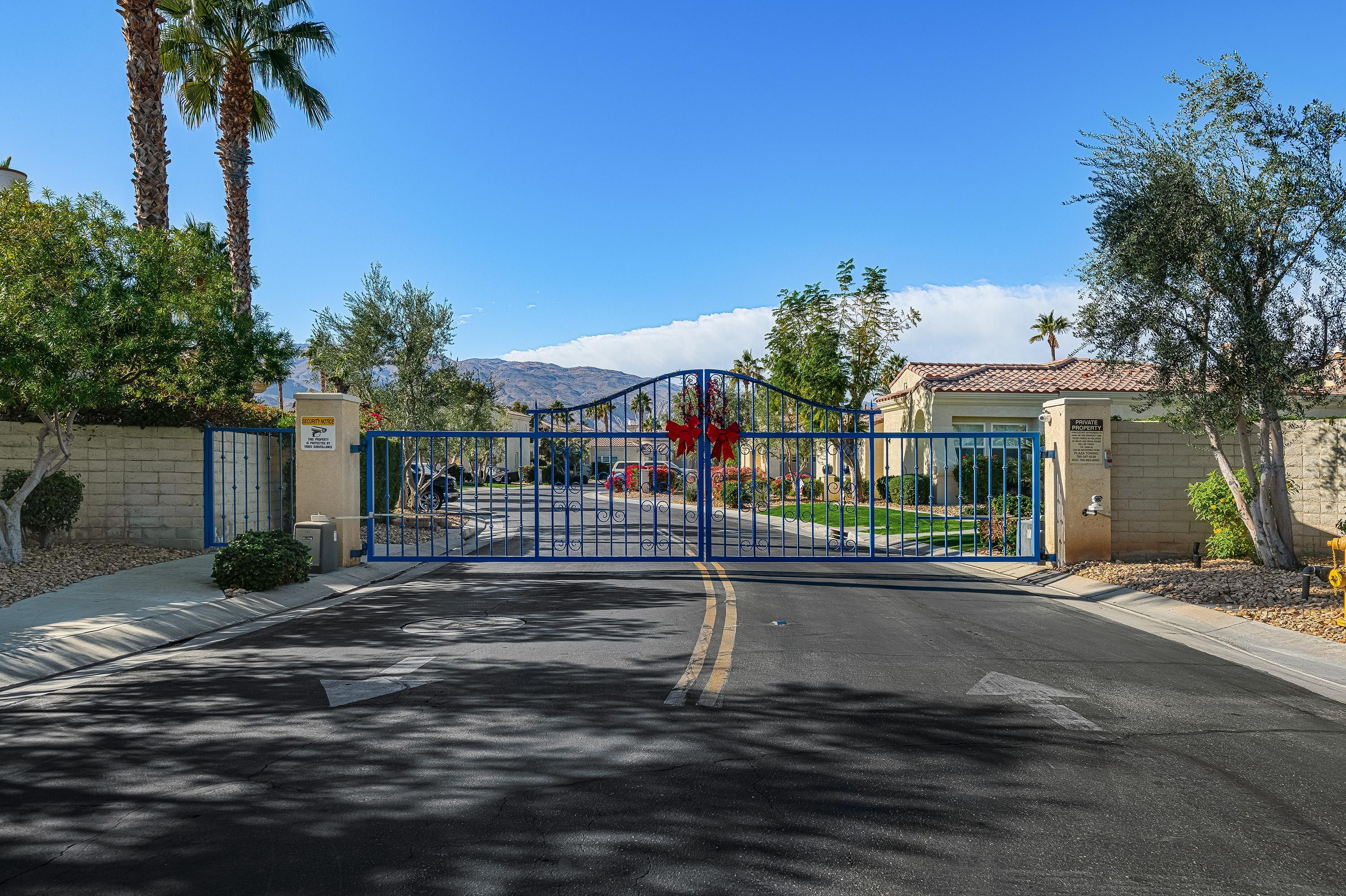 80921 Calle Azul La Quinta, CA 92253 - Photo 41 of 42 a front view of a house with a garden
