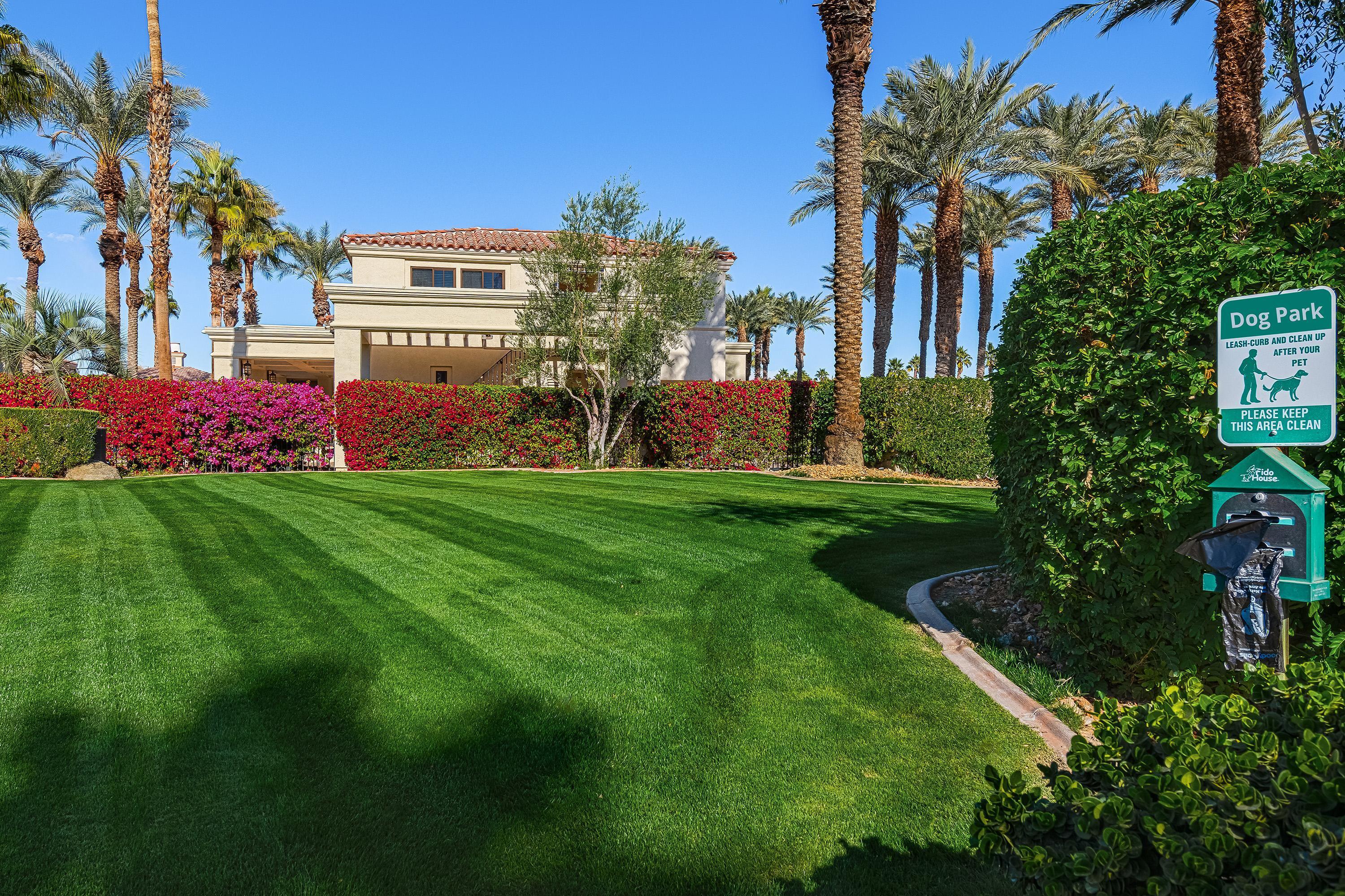 80921 Calle Azul La Quinta, CA 92253 - Photo 42 of 42 a building view with a garden space
