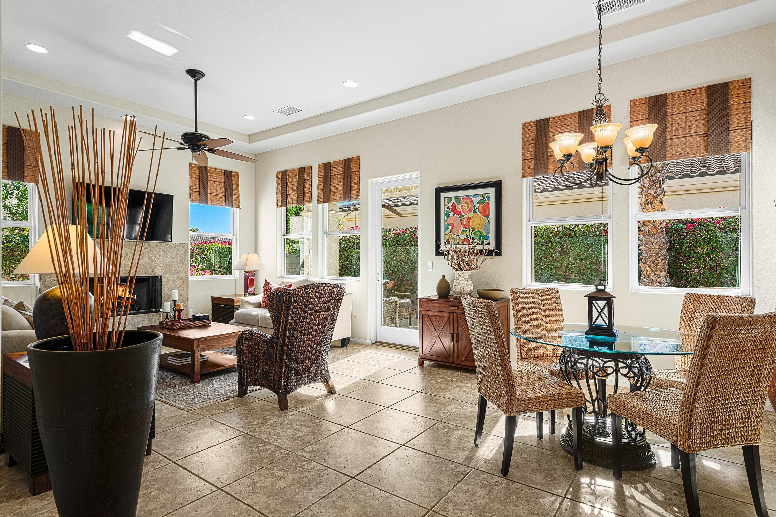 80921 Calle Azul La Quinta, CA 92253 - Photo 6 of 42 a dining room with furniture a chandelier and window