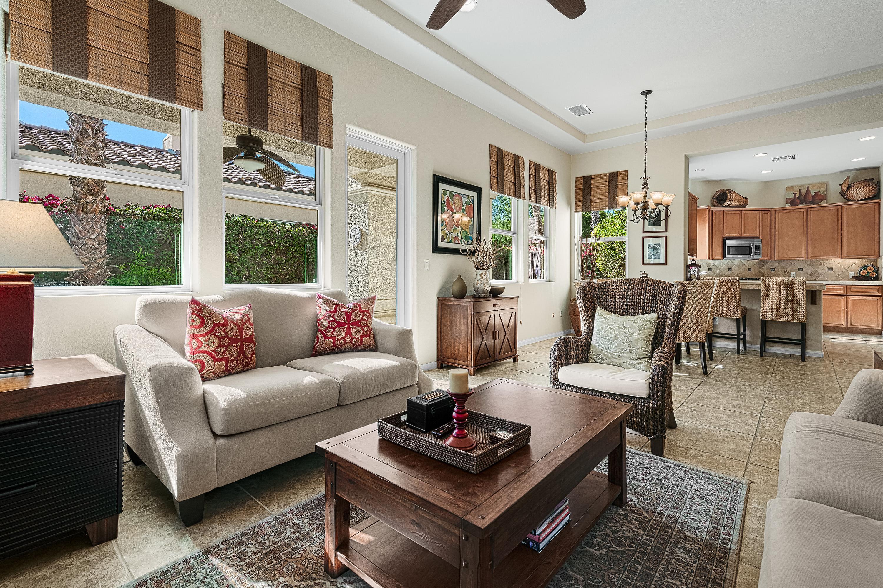 80921 Calle Azul La Quinta, CA 92253 - Photo 7 of 42 a living room with furniture and a large window