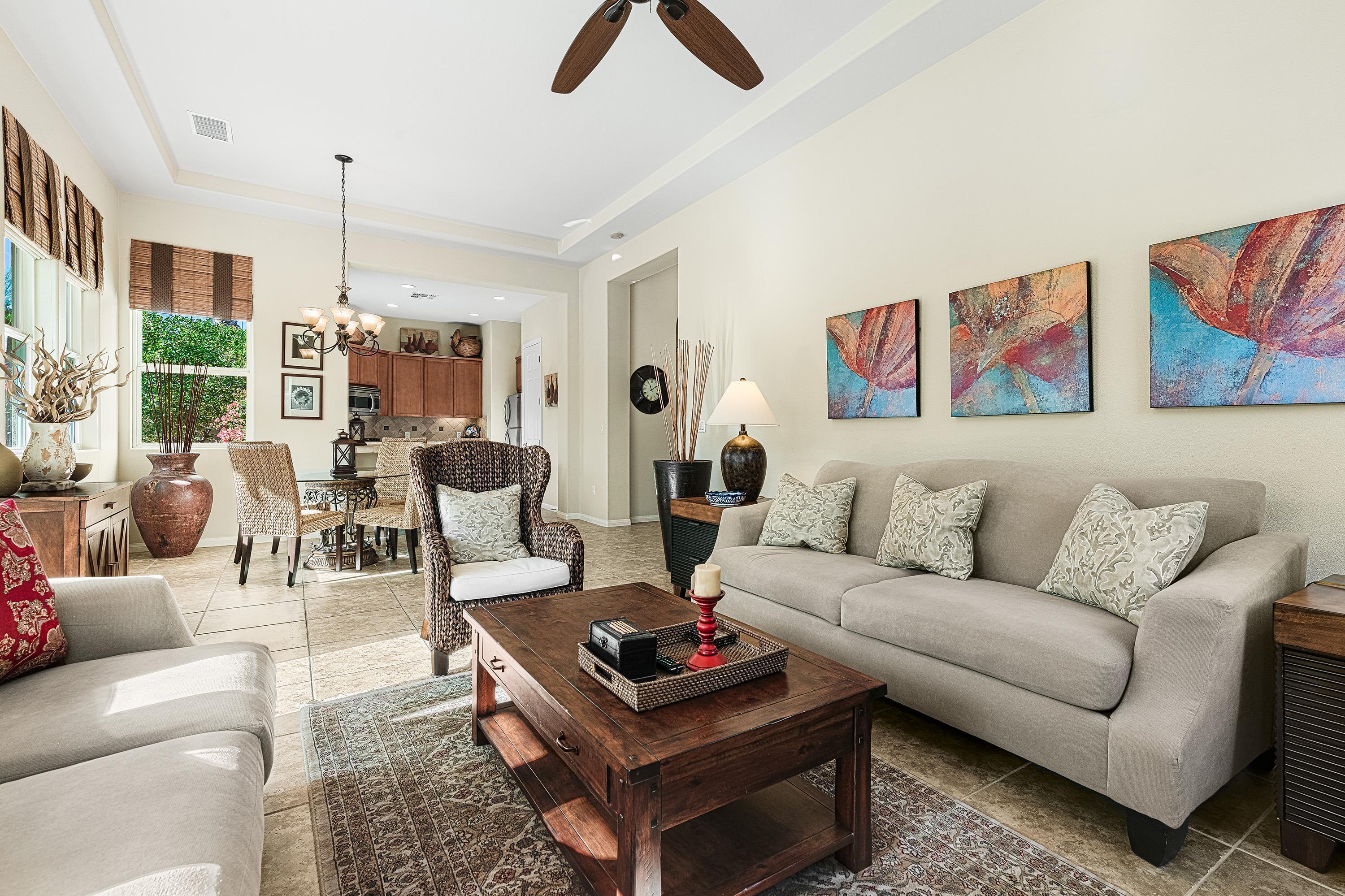 80921 Calle Azul La Quinta, CA 92253 - Photo 9 of 42 a living room with furniture a rug and white walls