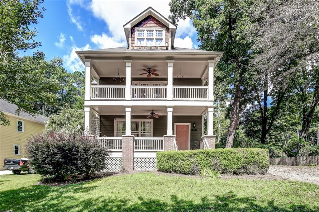 1541 Peachcrest Road Decatur, GA 30032 - Photo 1 of 1 a front view of a house with a garden