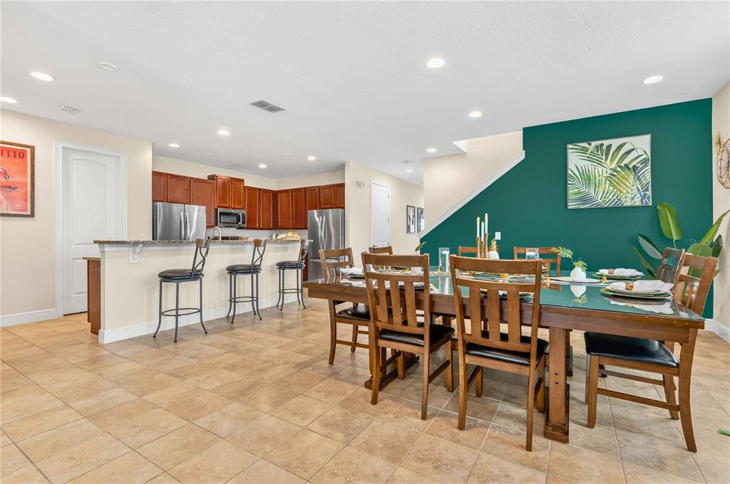 7639 Wilmington Loop Kissimmee, FL 34747 - Photo 12 of 79 a view of a dining area with furniture