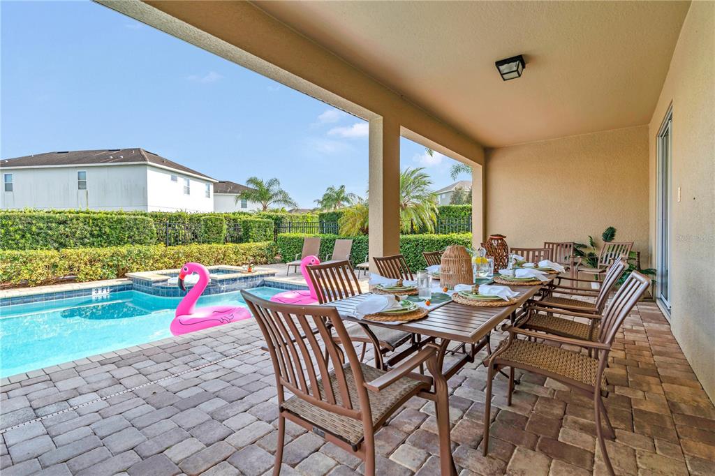 7639 Wilmington Loop Kissimmee, FL 34747 - Photo 59 of 79 a view of an chairs and table in the patio