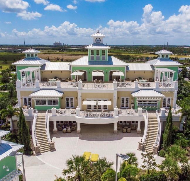 7639 Wilmington Loop Kissimmee, FL 34747 - Photo 67 of 79 an aerial view of a multi story building with yard