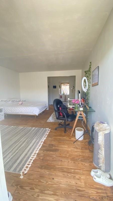 7440 Byron Avenue, Unit 12B Miami Beach, FL 33141 - Photo 12 of 22 a living room with furniture