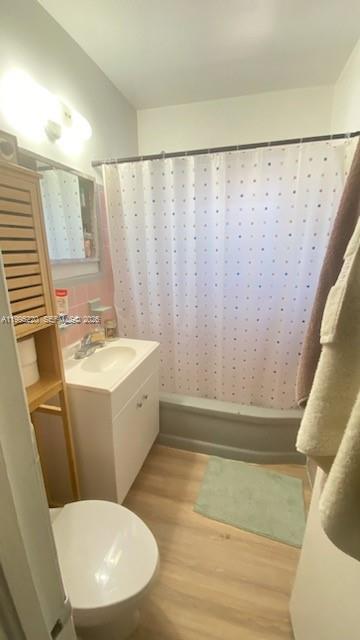 7440 Byron Avenue, Unit 12B Miami Beach, FL 33141 - Photo 6 of 22 a bathroom with a sink and a mirror