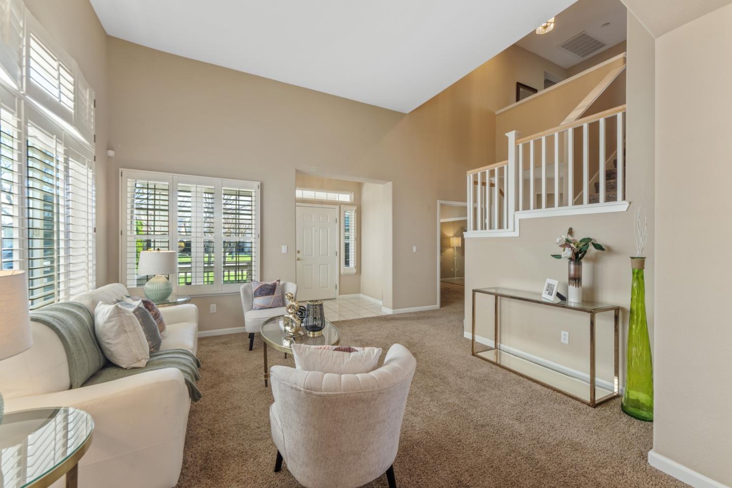 1559 Cindy Way Tracy, CA 95377 - Photo 6 of 28 a living room with furniture and a table