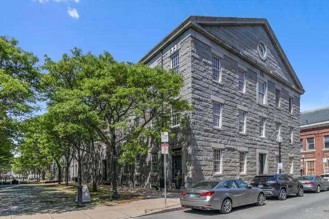 a car parked in front of a building