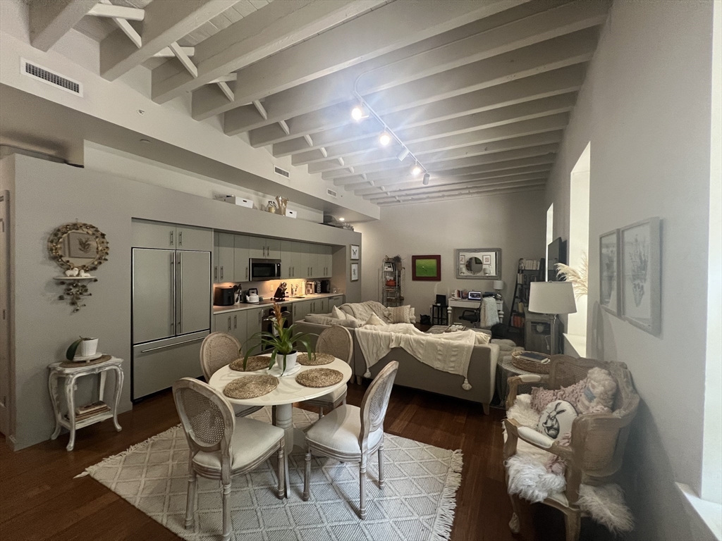 33 3rd Avenue, Unit U5B Boston, MA 02129 - Photo 9 of 16 a work room with furniture