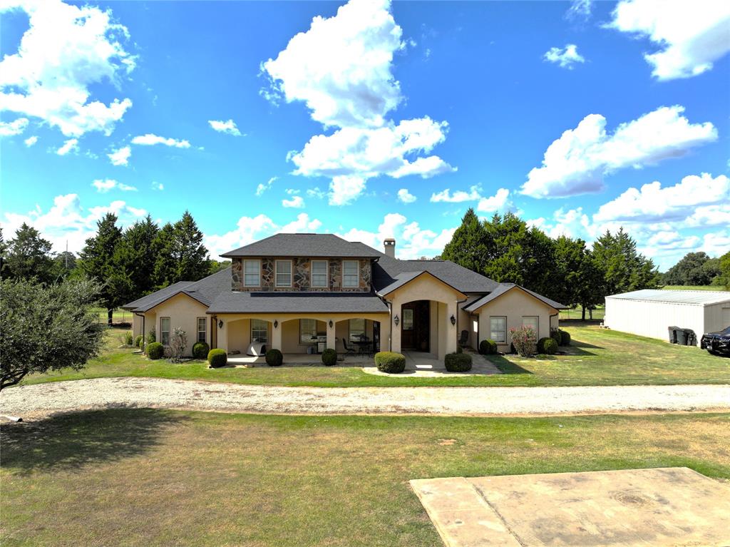 421 Weakes Street Eustace, TX 75124 - Photo 38 of 40 a front view of a house with a yard