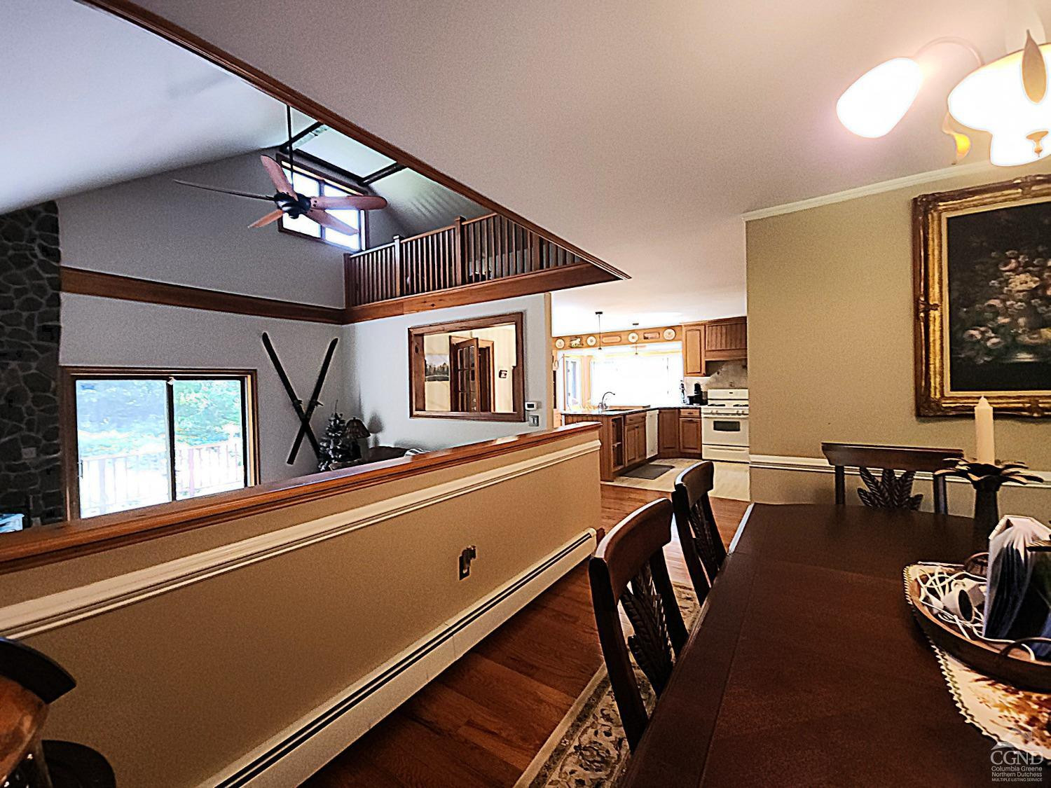 159 Toles Hollow Road Conesville, NY 12076 - Photo 18 of 53 a view of a dining room with furniture window and wooden floor