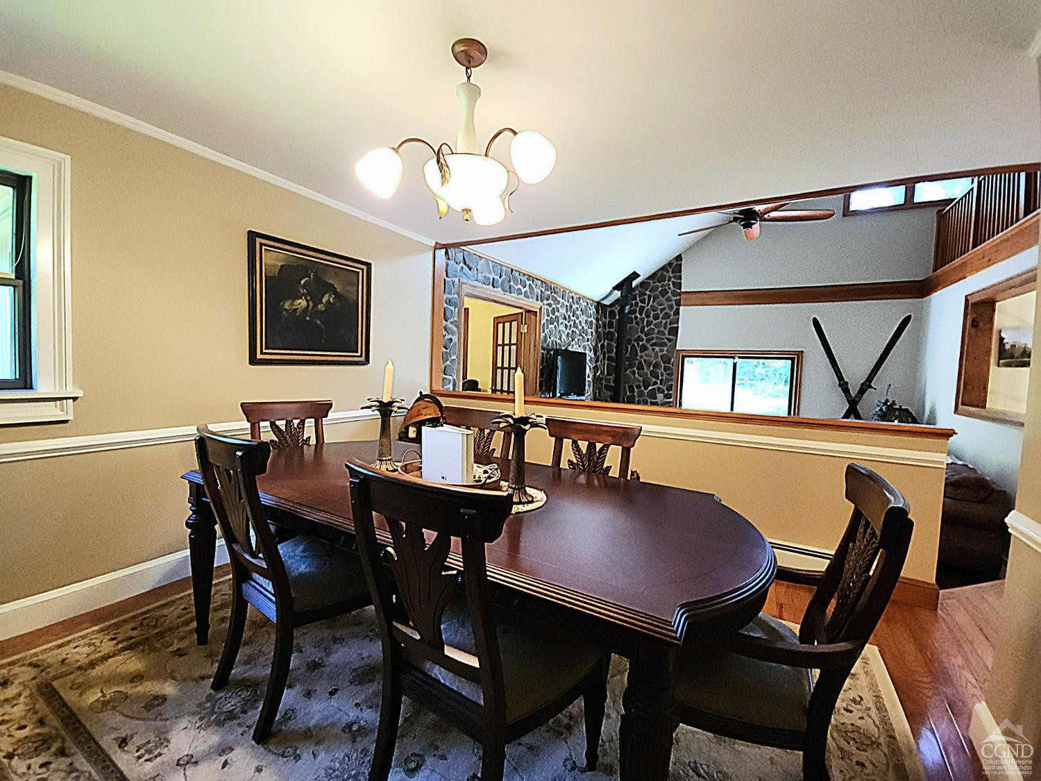 159 Toles Hollow Road Conesville, NY 12076 - Photo 19 of 53 a view of a dining room with furniture and a chandelier