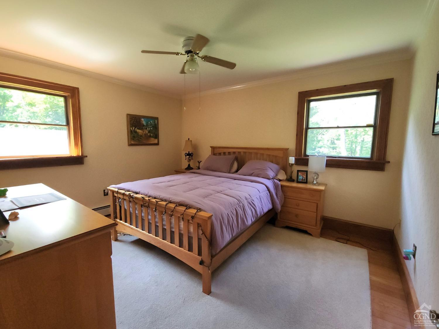 159 Toles Hollow Road Conesville, NY 12076 - Photo 27 of 53 a bedroom with a bed and window