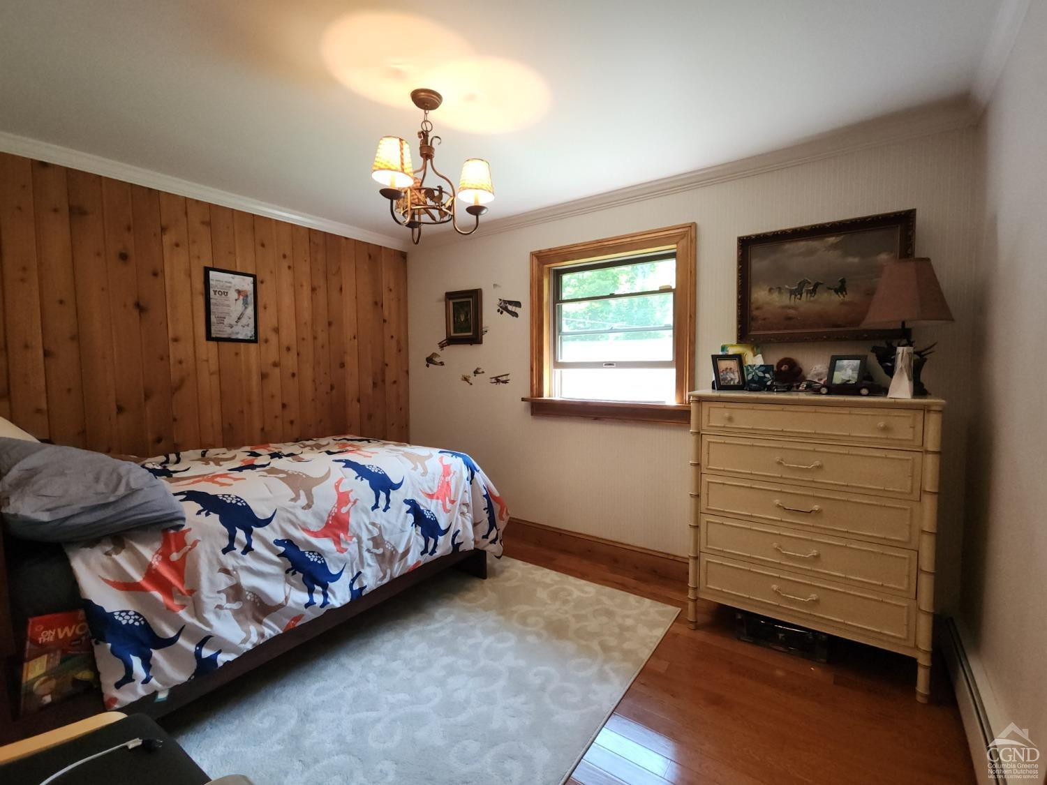 159 Toles Hollow Road Conesville, NY 12076 - Photo 28 of 53 a bedroom with a bed and a flat screen tv