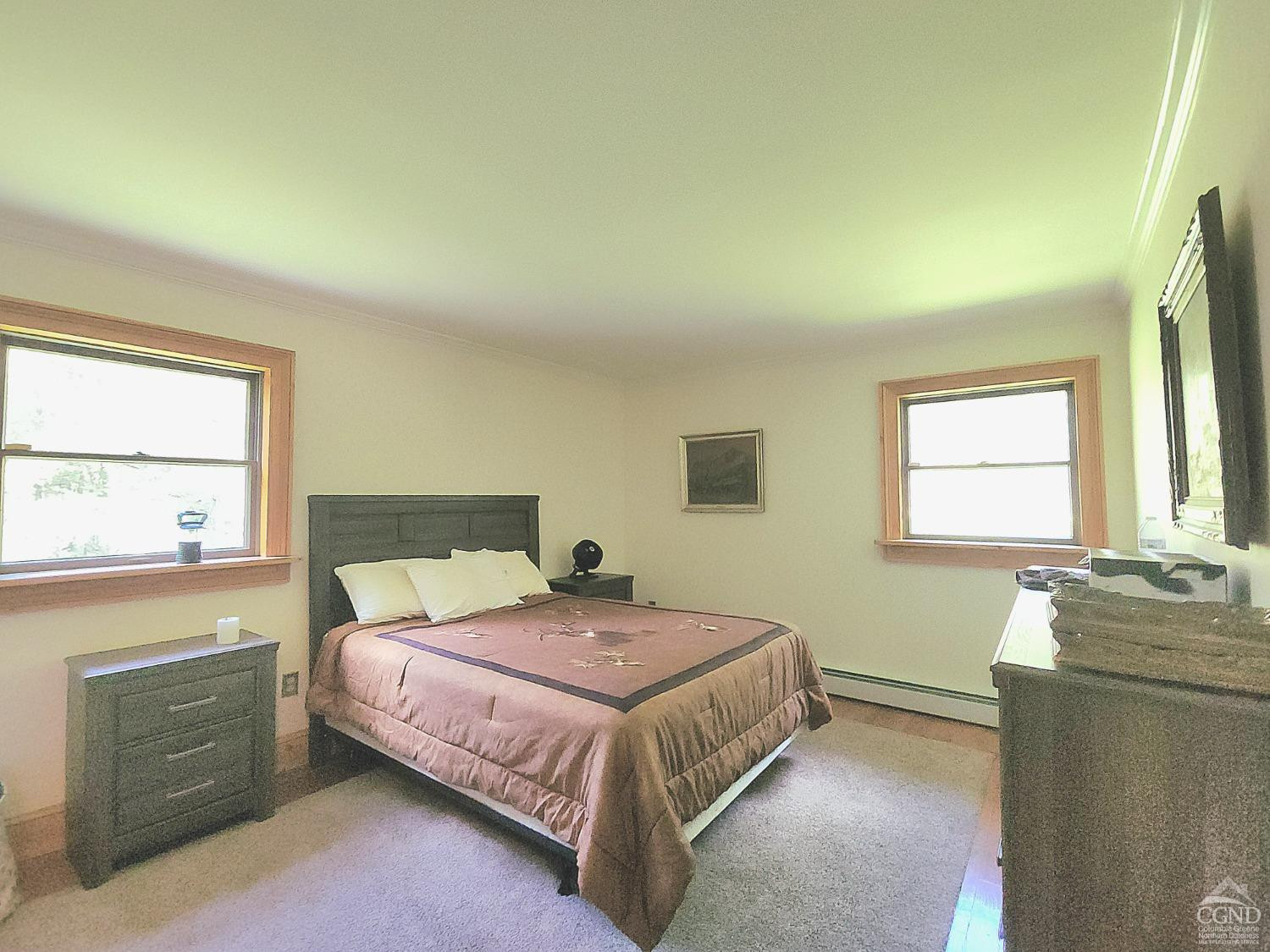 159 Toles Hollow Road Conesville, NY 12076 - Photo 29 of 53 a bedroom with a bed and a window