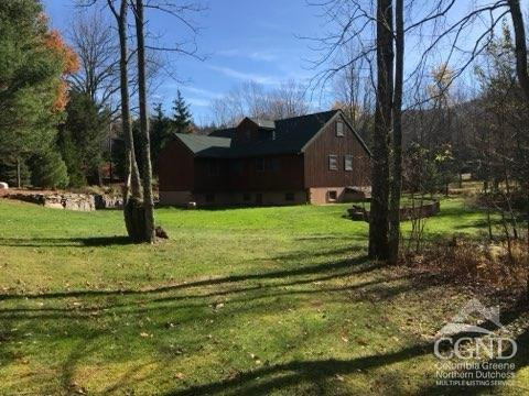 159 Toles Hollow Road Conesville, NY 12076 - Photo 42 of 53 a view of a house with a yard