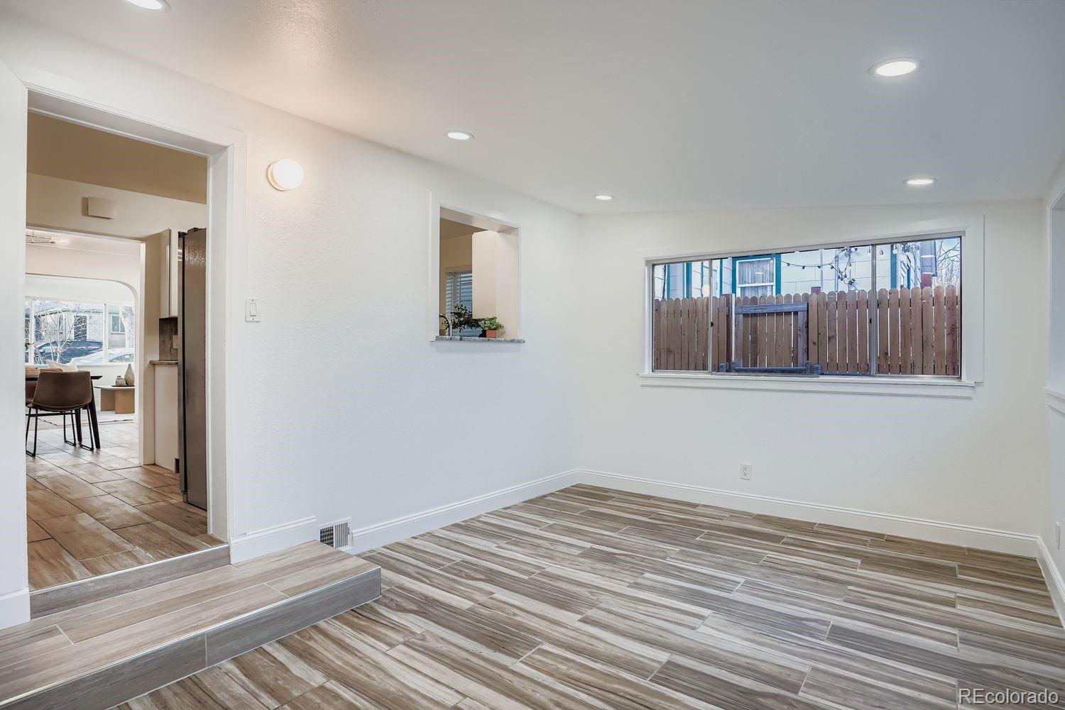3822 Julian Street Denver, CO 80211 - Photo 15 of 28 a view of a room with wooden floor