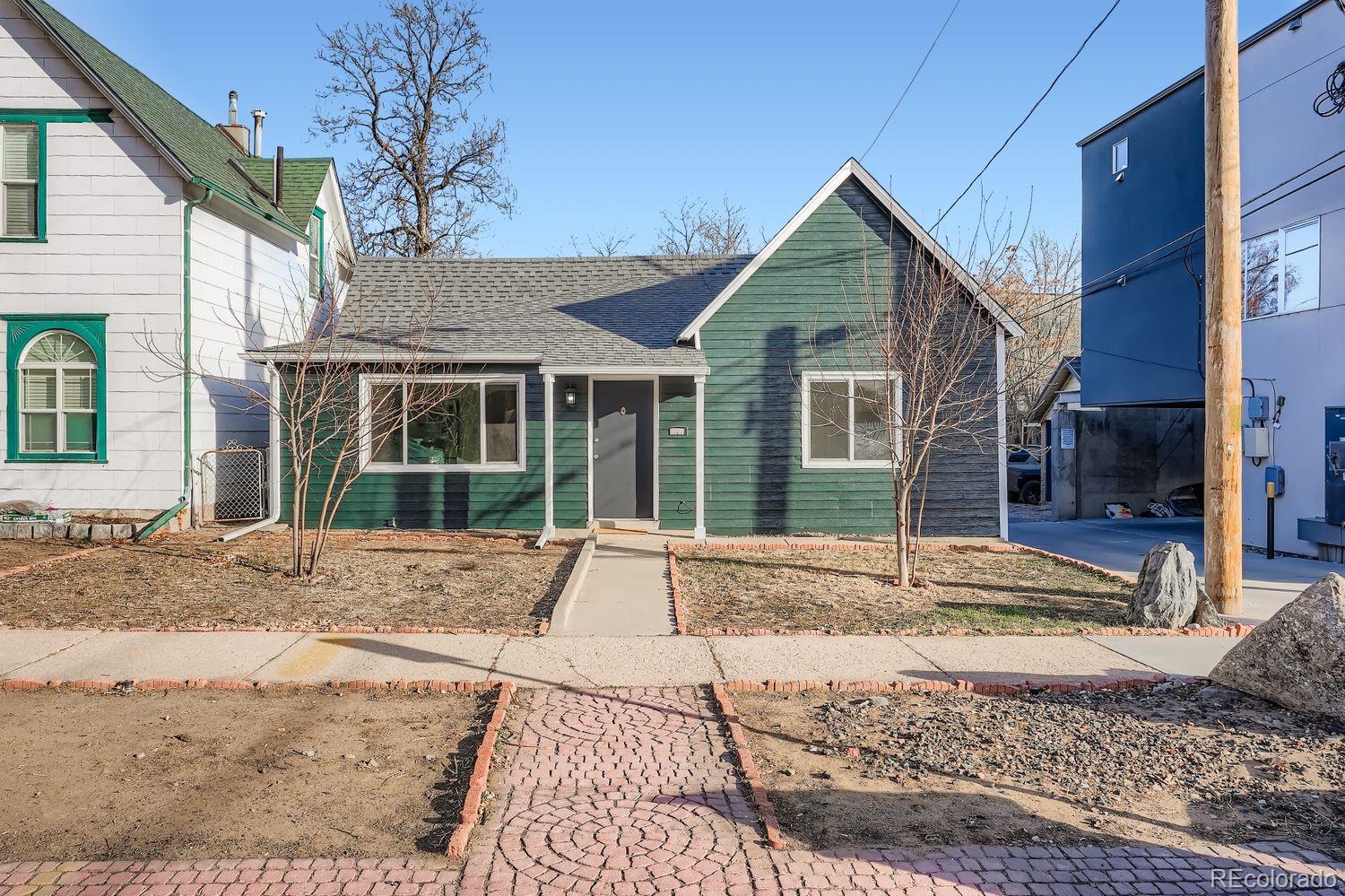 3822 Julian Street Denver, CO 80211 - Photo 2 of 28 a view of large house with a sink and yard
