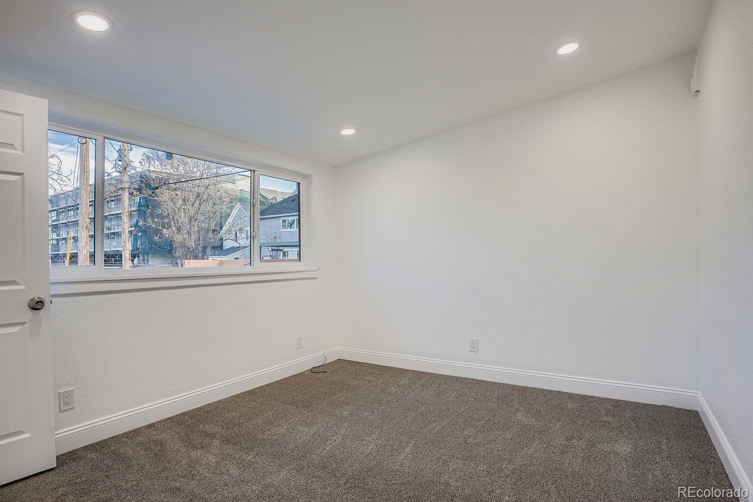 3822 Julian Street Denver, CO 80211 - Photo 21 of 28 an empty room with a window