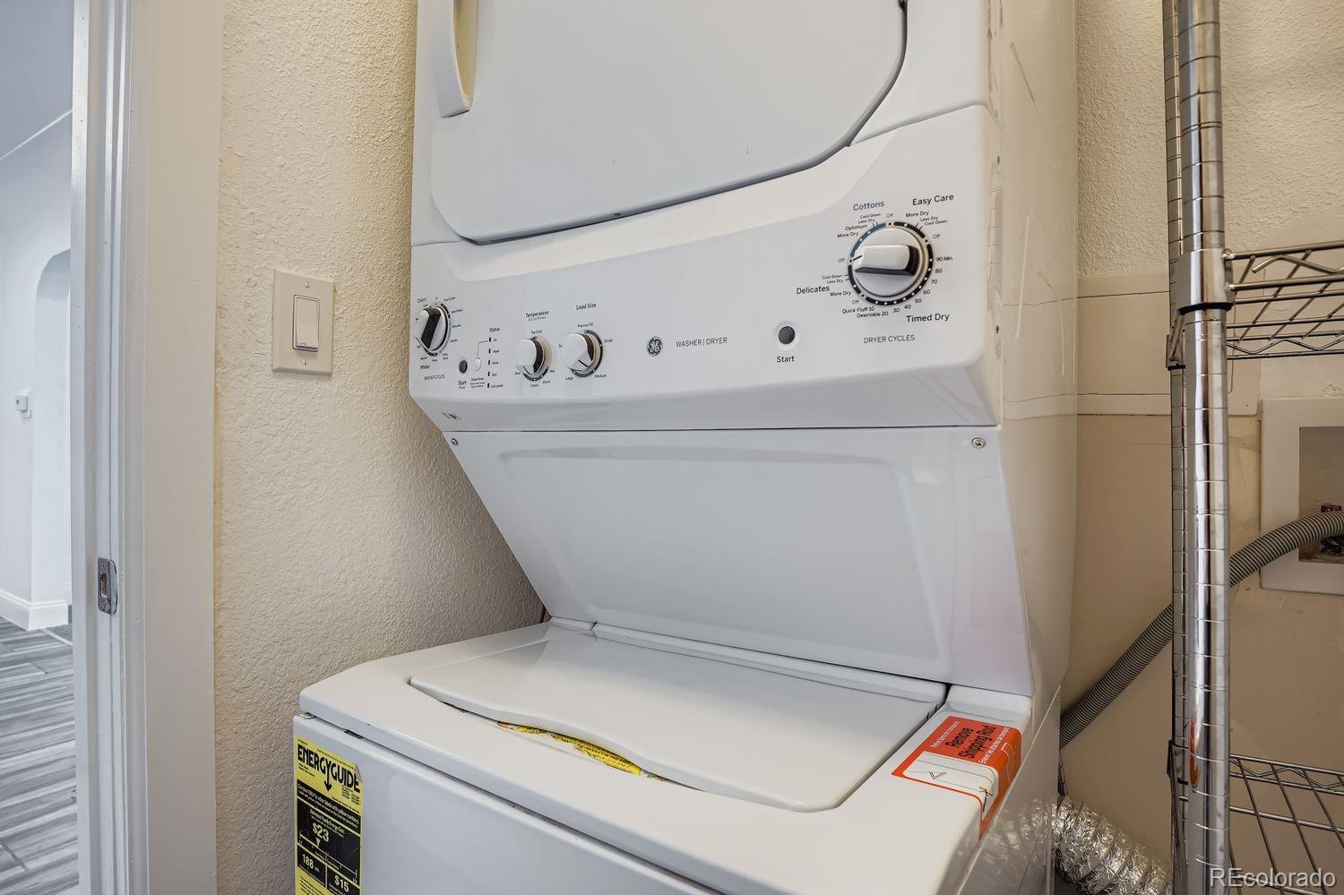 3822 Julian Street Denver, CO 80211 - Photo 24 of 28 a utility room with dryer and washer