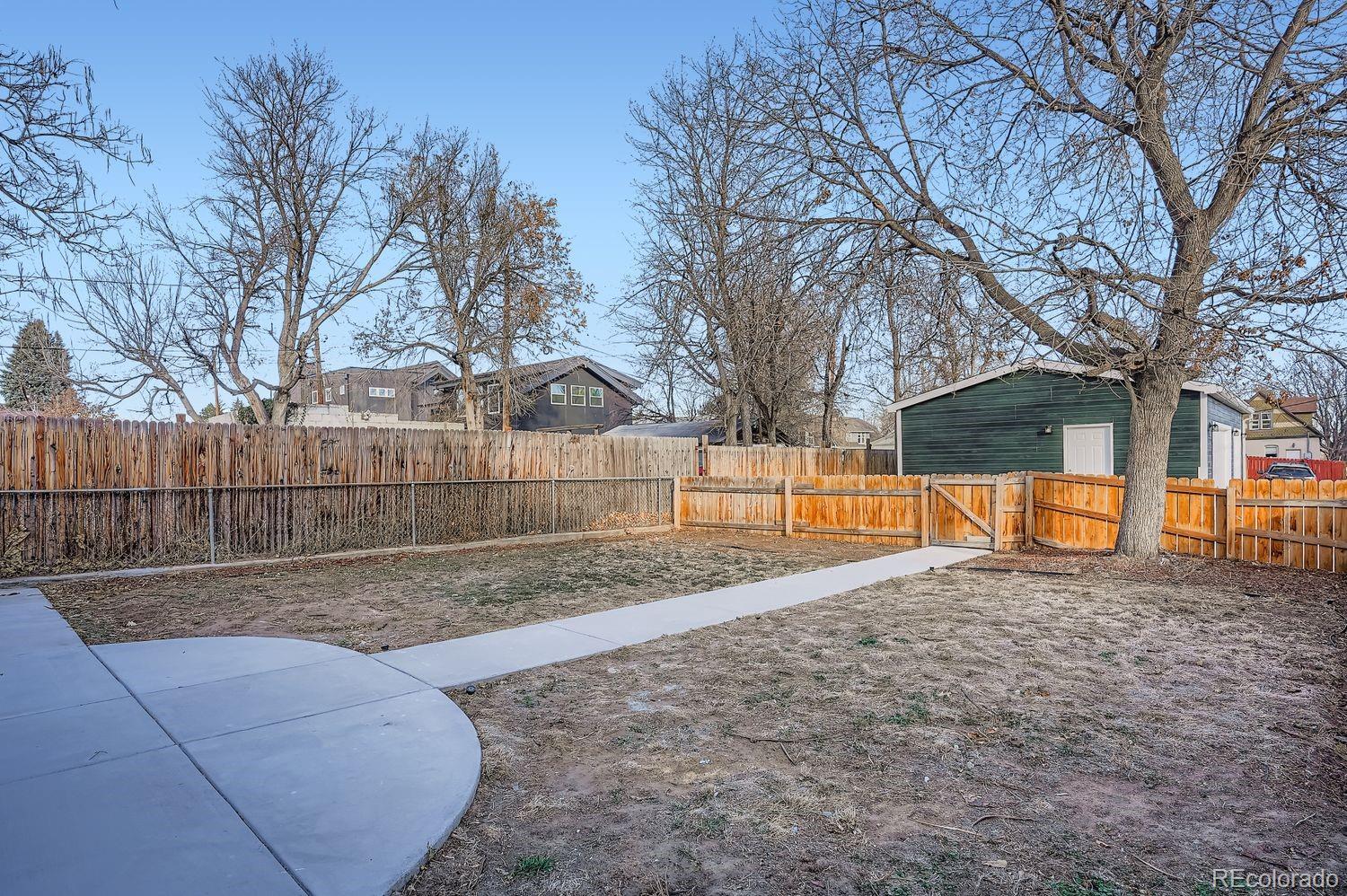 3822 Julian Street Denver, CO 80211 - Photo 25 of 28 a view of backyard with tree