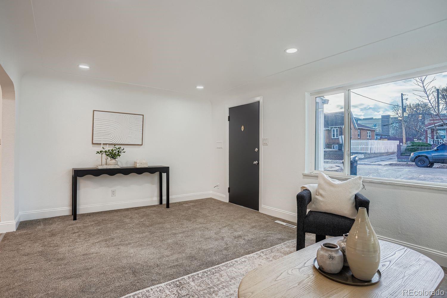 3822 Julian Street Denver, CO 80211 - Photo 5 of 28 a living room with furniture