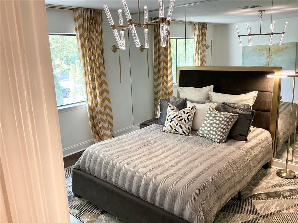 3823 Paces Ferry West Atlanta, GA 30339 - Photo 11 of 33 a bedroom with a bed and a window