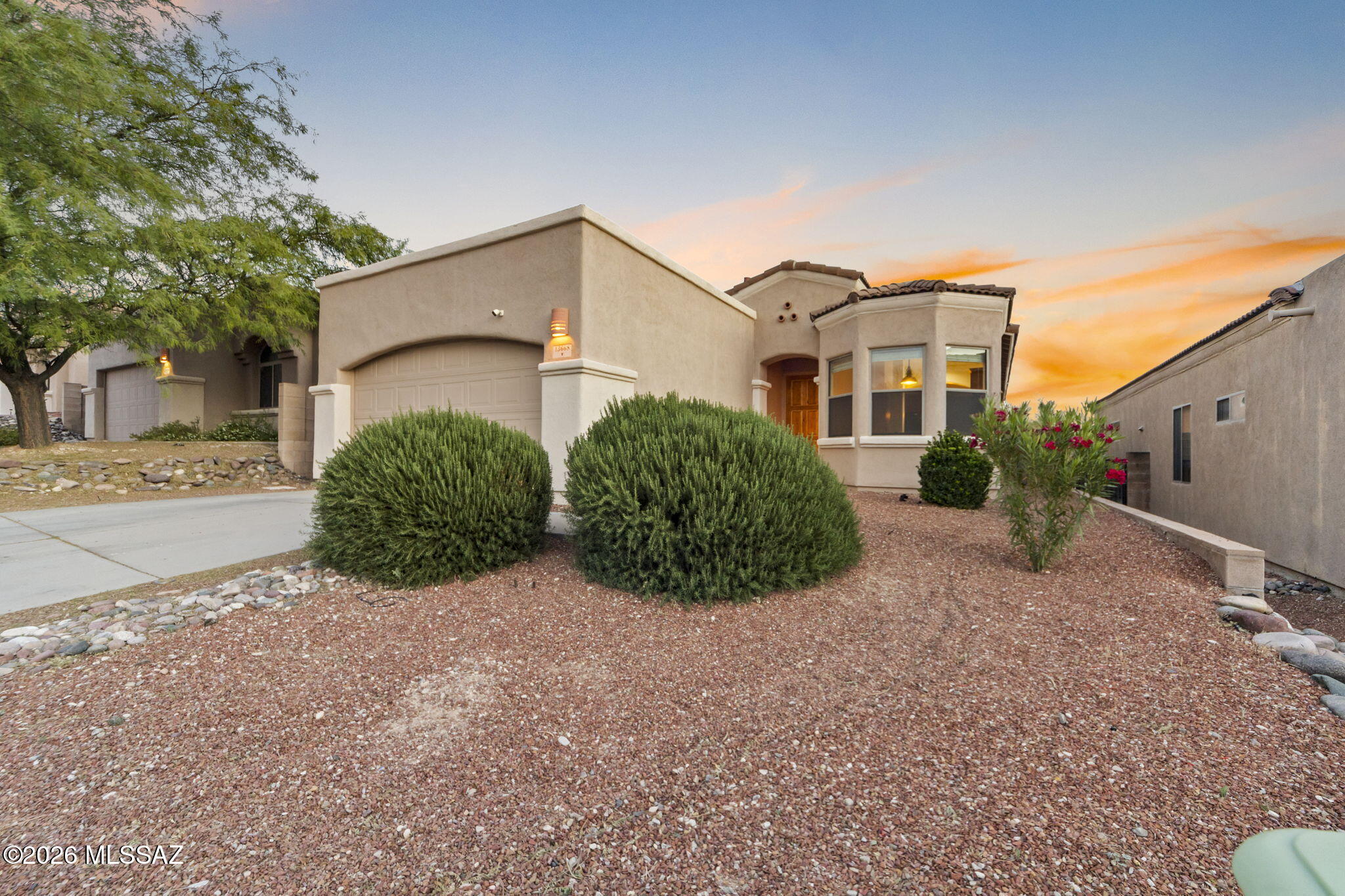 13668 East High Plains Ranch Street Vail, AZ 85641 - Photo 50 of 51 a view of a street with a house