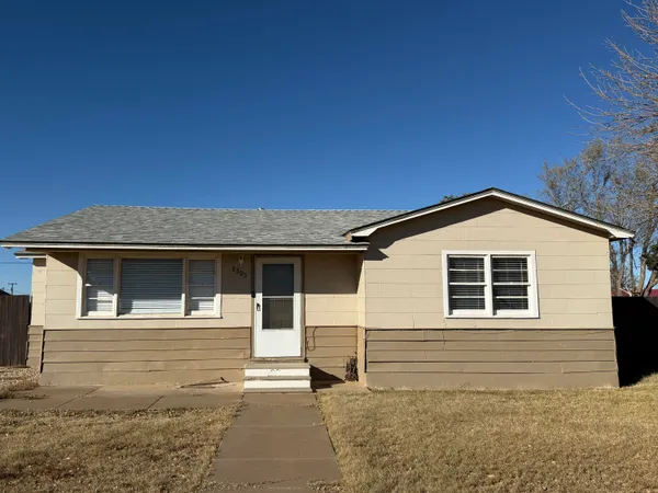 a front view of a house with garage