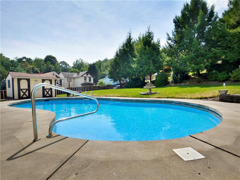 201 Harrison Road Turtle Creek, PA 15145 - Photo 22 of 25 In-ground salt water pool features a very nice dressing area! It also has a picnic area.