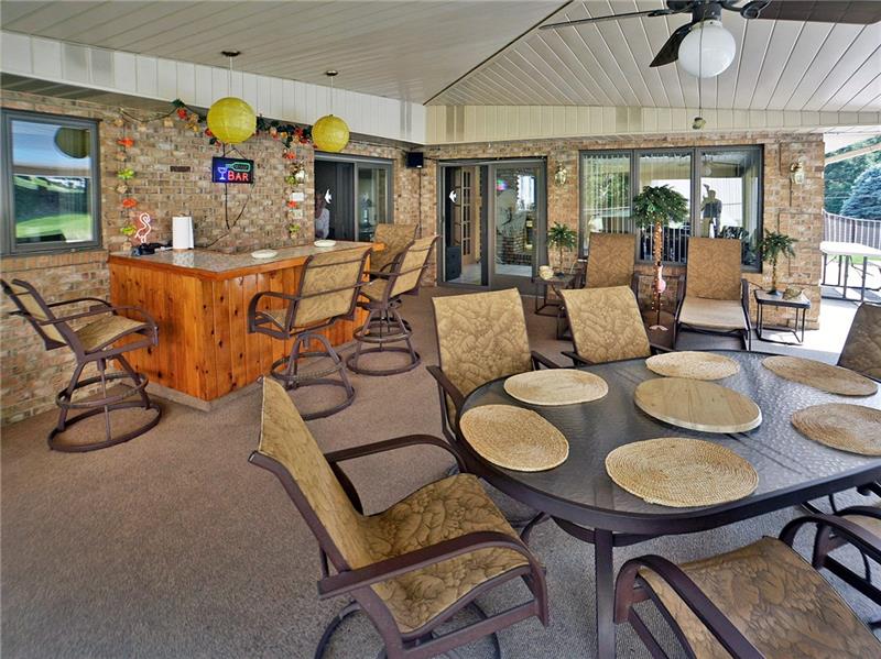 201 Harrison Road Turtle Creek, PA 15145 - Photo 24 of 25 Super covered party area by pool for entertaining also has a great bar!
