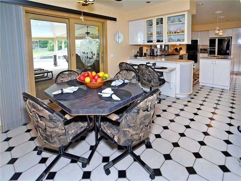 201 Harrison Road Turtle Creek, PA 15145 - Photo 4 of 25 Breakfast room off kitchen with French doors to porch and pool area