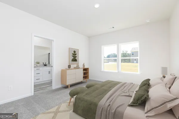 a bed room with a bed and a window