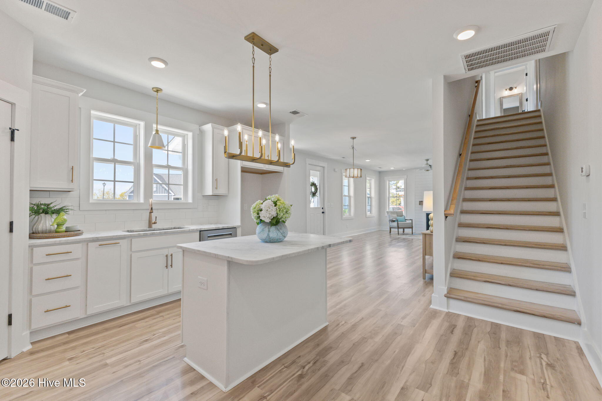 658 Fishermans Point Newport, NC 28570 - Photo 13 of 44 Kitchen and Stairwell