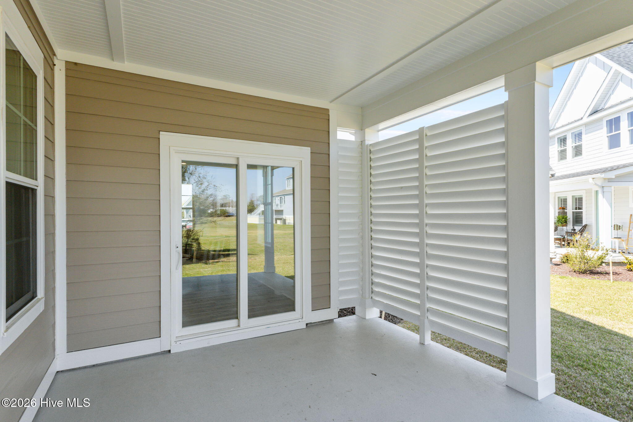 658 Fishermans Point Newport, NC 28570 - Photo 17 of 44 Back Porch off Living Room and Primary Bedroom with Privacy Screen