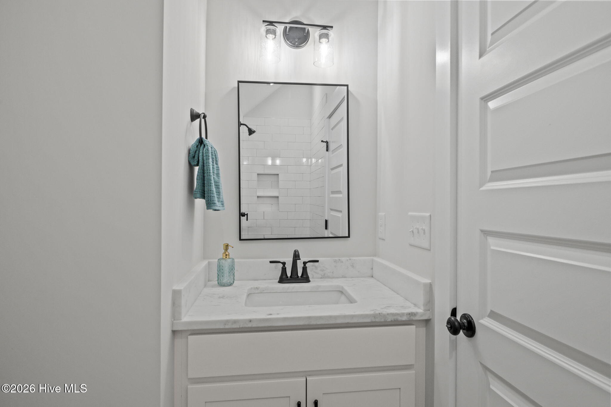 658 Fishermans Point Newport, NC 28570 - Photo 26 of 44 Powder Room off Kitchen and Laundry