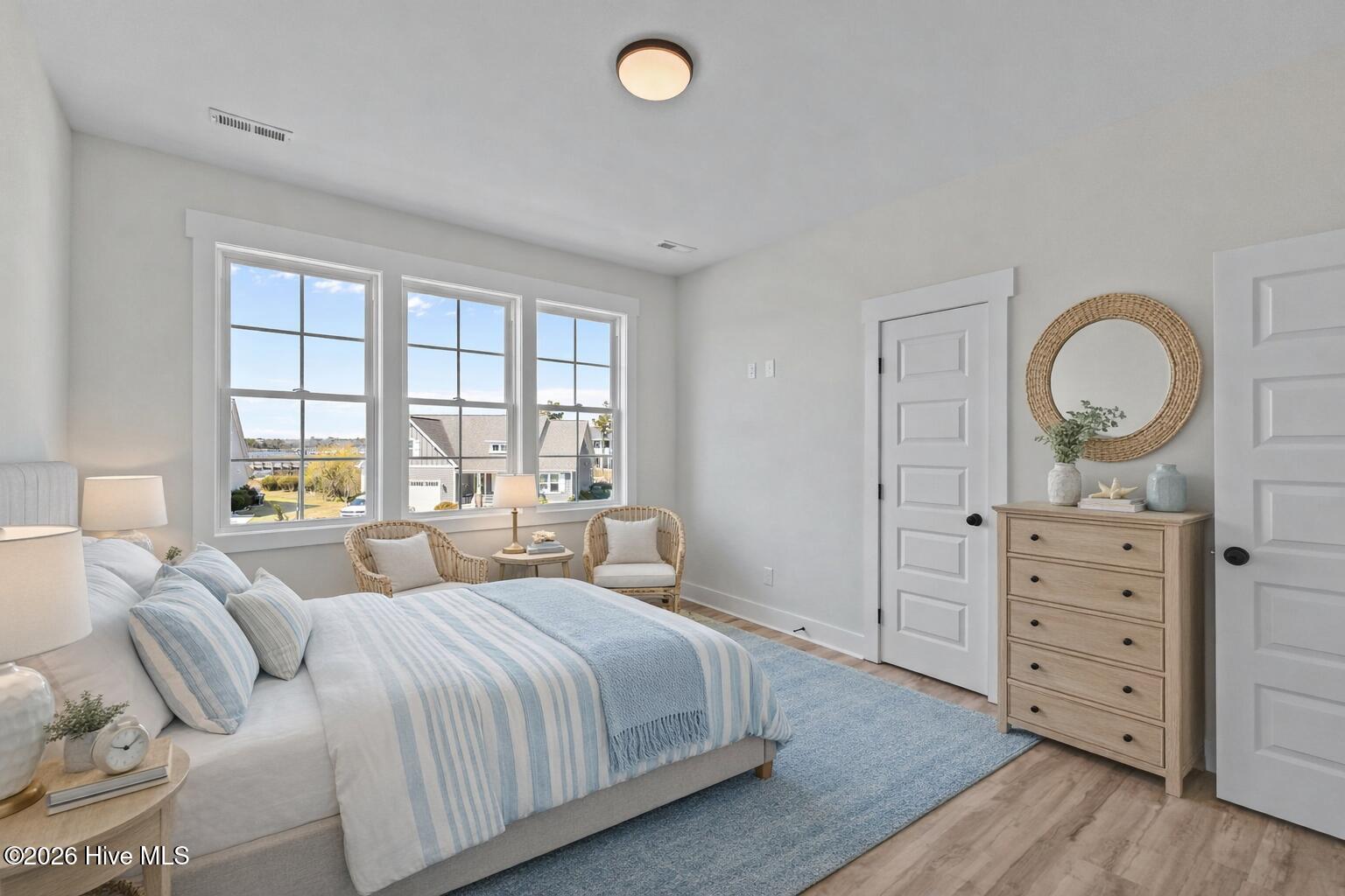 658 Fishermans Point Newport, NC 28570 - Photo 29 of 44 Coastal-inspired bedroom with natural li
