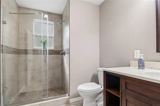a bathroom with a sink and toilet