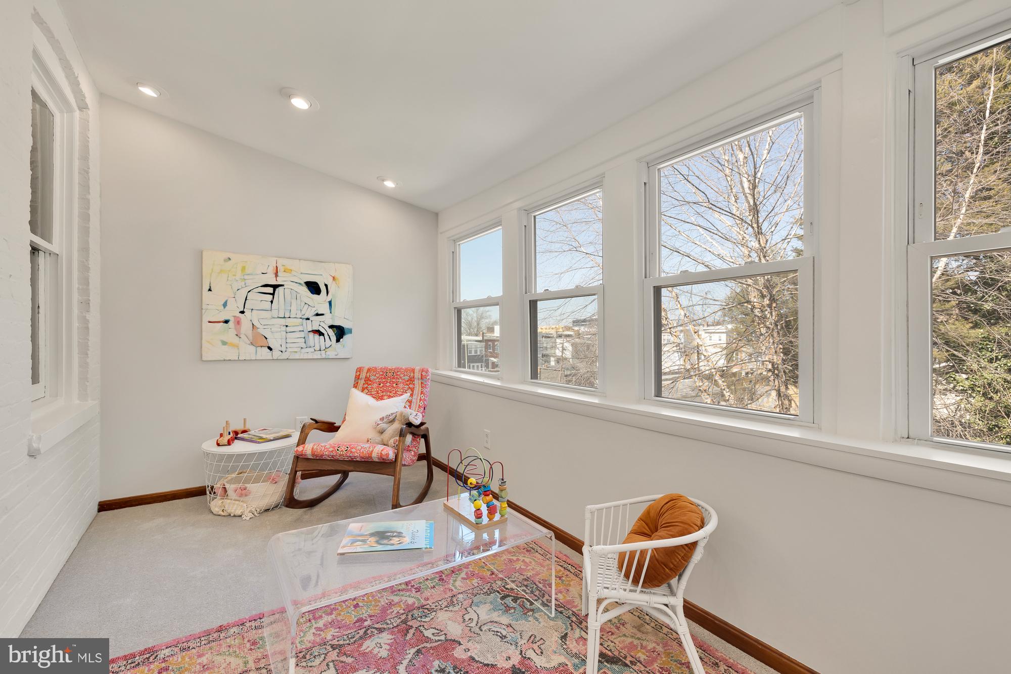 28 Bryant Street Northeast Washington, DC 20002 - Photo 26 of 41 a living room with furniture and a window