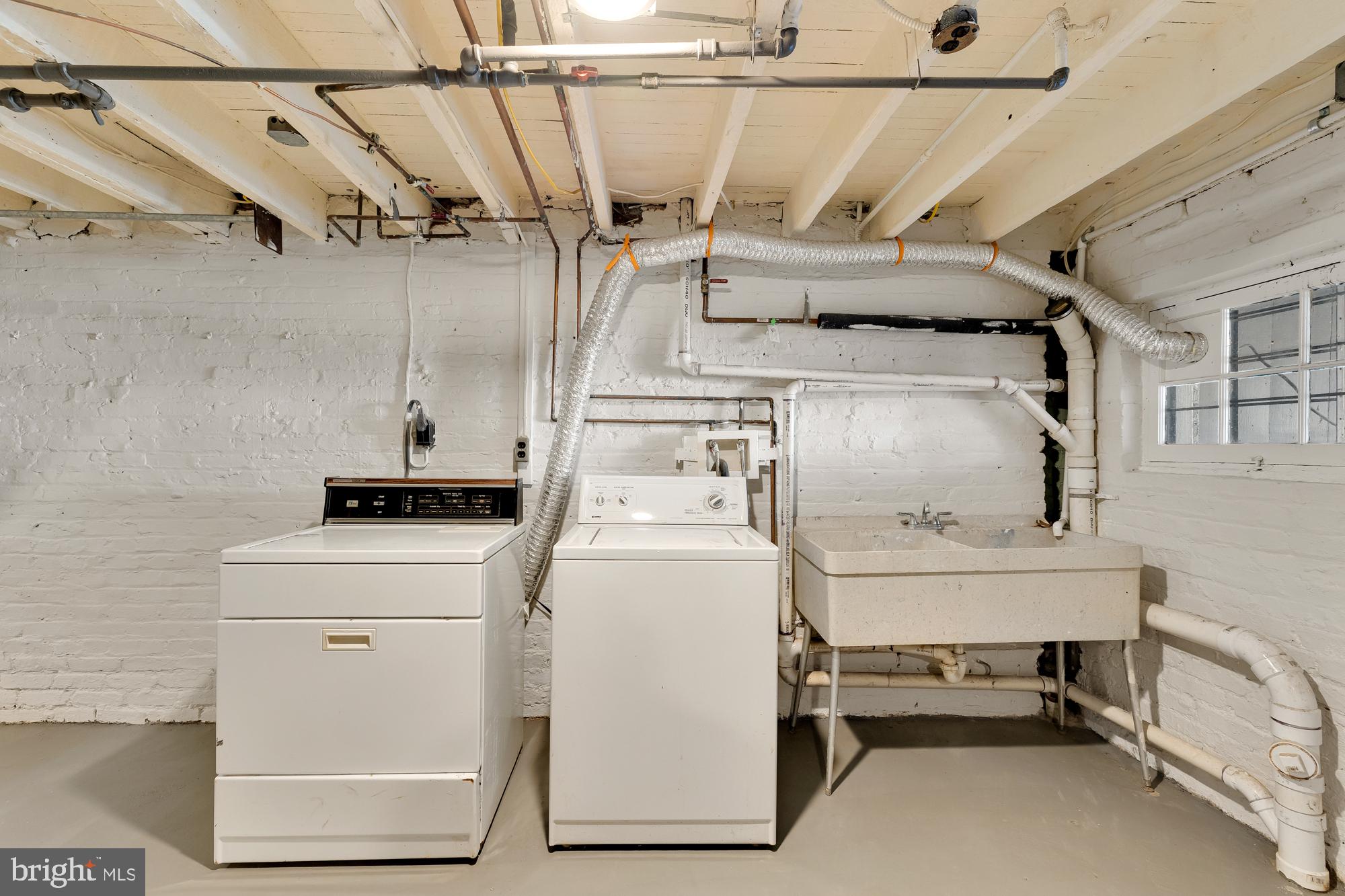 28 Bryant Street Northeast Washington, DC 20002 - Photo 37 of 41 a utility room with dryer and washer