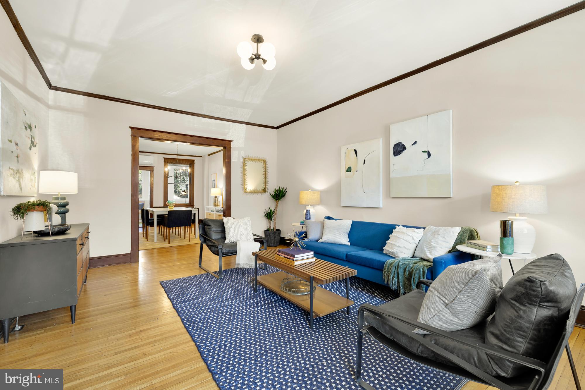 28 Bryant Street Northeast Washington, DC 20002 - Photo 5 of 41 a living room with furniture a couch and wooden floor